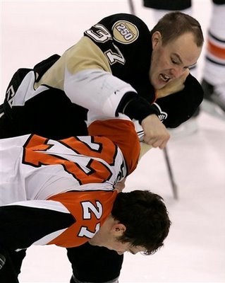 capt.5166b7cdd2ae4ba19f71ce02b35e49a7.flyers_penguins_hockey_pagp101.jpg